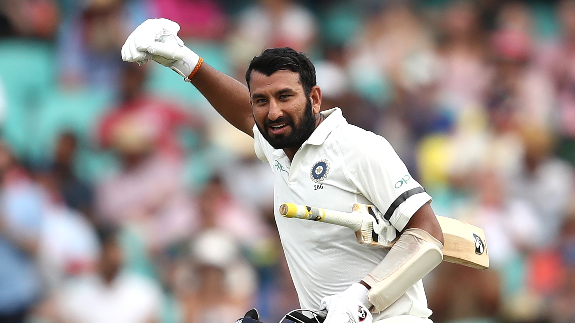 Cheteshwar Pujara celebrates